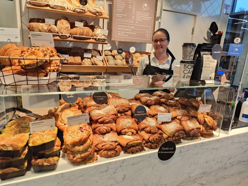woman selling bakeries
