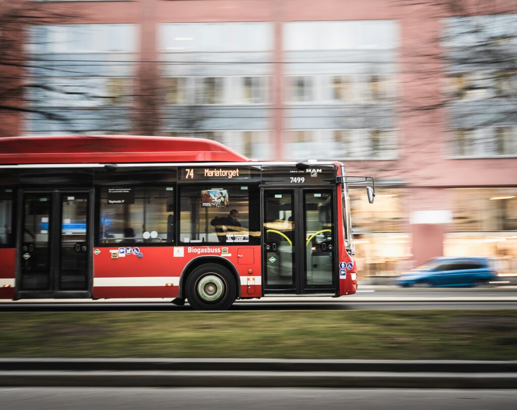 red bus passing by heading to mariatorget
